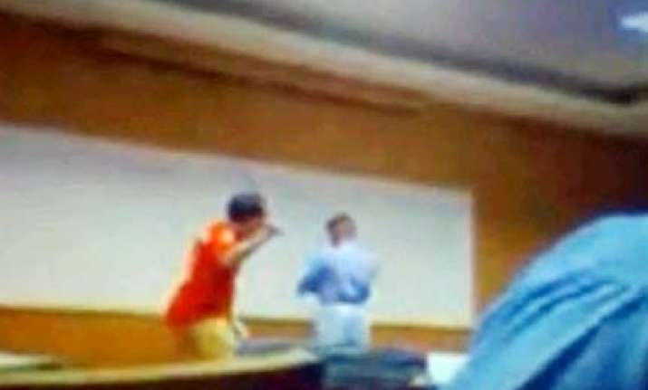 thai teacher beats 40 students with cane wrapped with