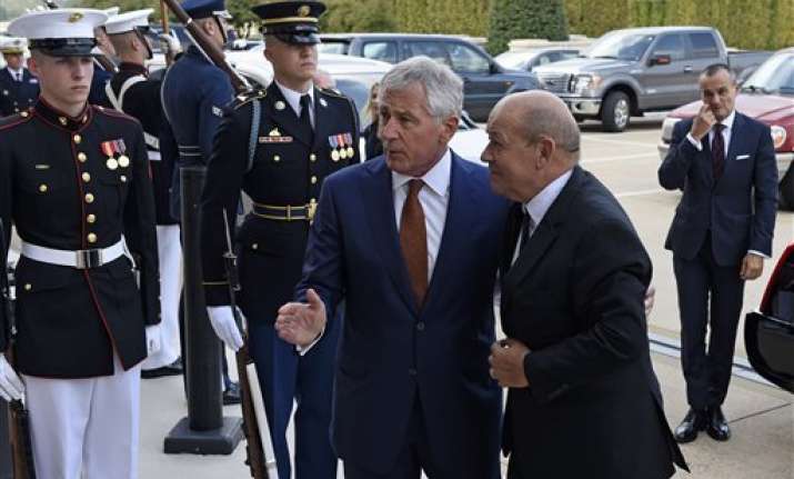 hagel french minister talk about syria strikes