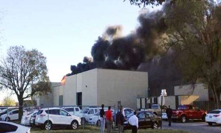 four die as plane crashes into building in us