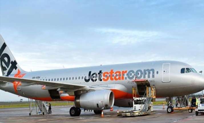 australian airlines cancel flights to bali due to volcano