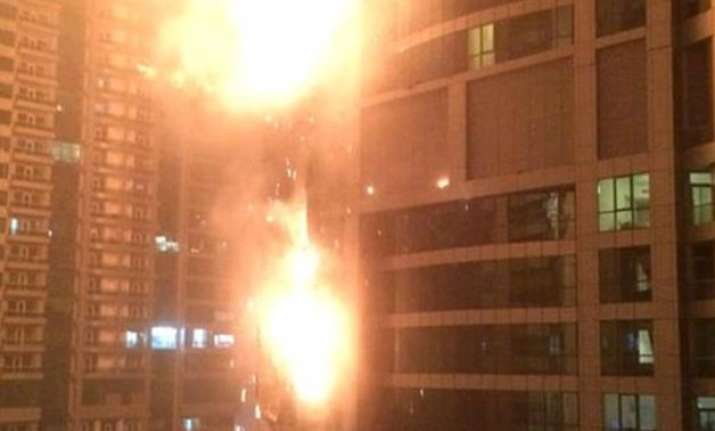 building in dubai s marina district in flames