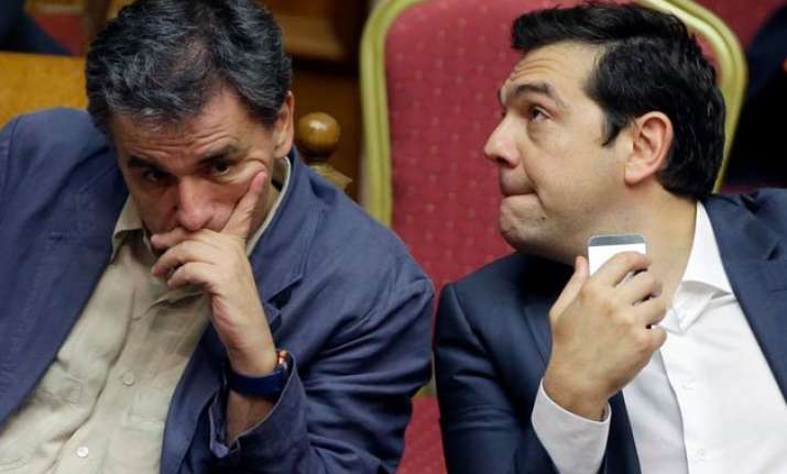 greek lawmakers pass austerity bill despite dissent