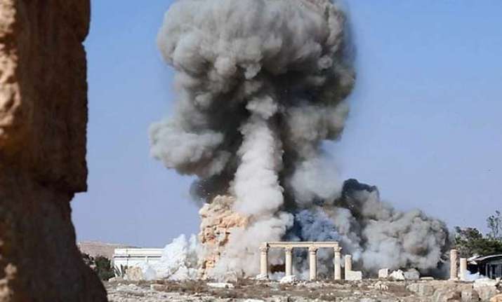 islamic state militants tie captives to palmyra columns