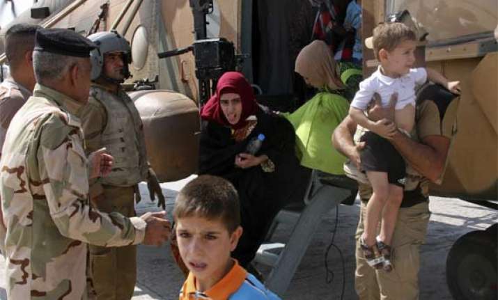 iraqi forces break militant siege of shiite town