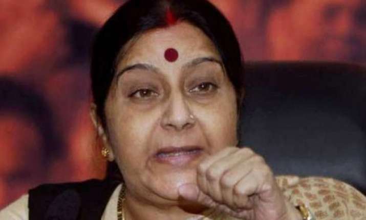 sushma swaraj meets counterparts from nepal sri lanka