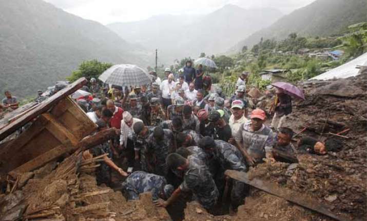landslides bury nepal villages killing at least 30 people
