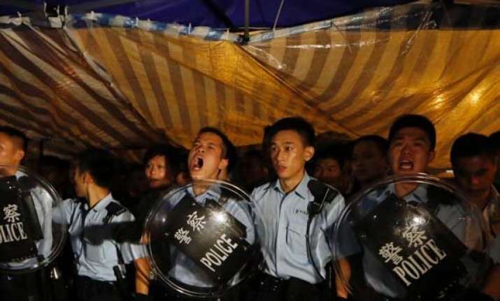 hong kong police move in against protest zone