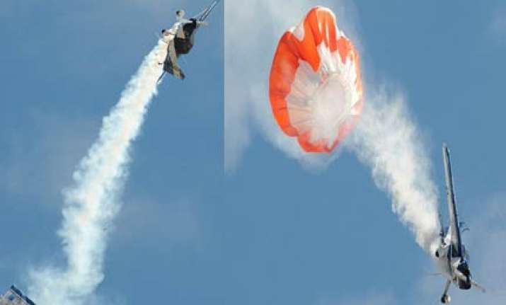 plane s wing snaps off mid air pilot walks away with burnt