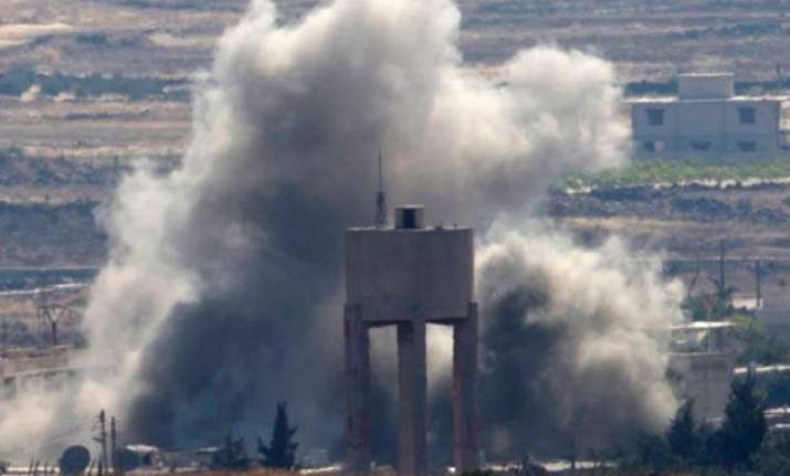 using russia s cover iran starts sending fighters to syria