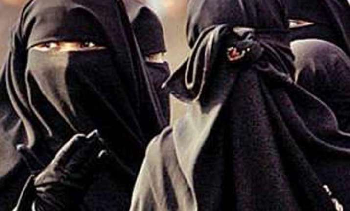 chinese city in restive muslim region bans burqa