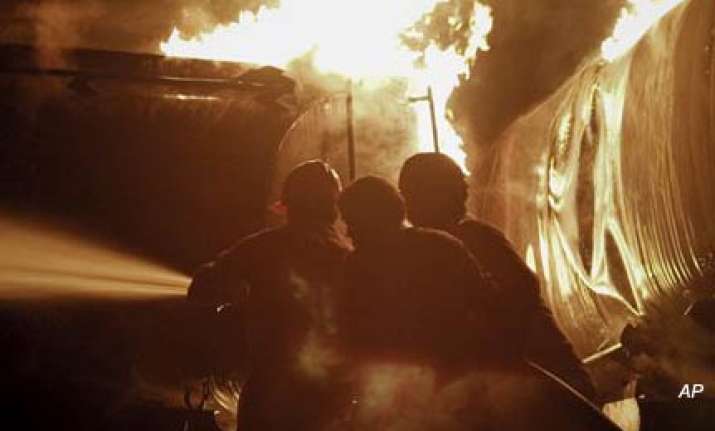 three killed as 20 nato tankers set ablaze in pakistan