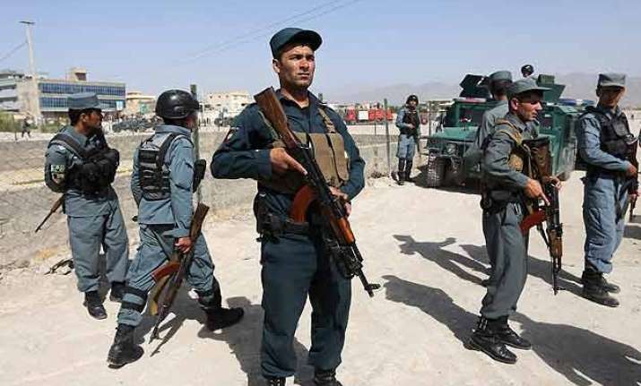 car bombing kills at least 26 civilians near afghan base