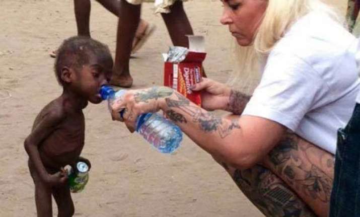 heart breaking starved nigerian toddler saved by a young
