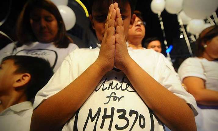 relatives torn over possible 1st debris from missing mh370