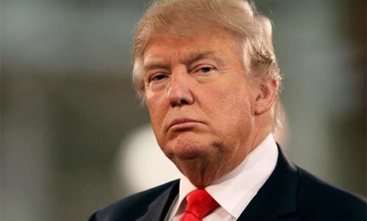 bernie sanders accuses donald trump of racist effort
