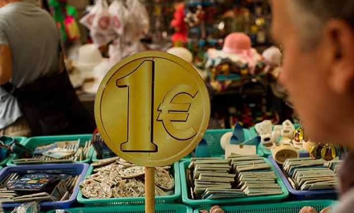 greece gets relief from creditors after first austerity test