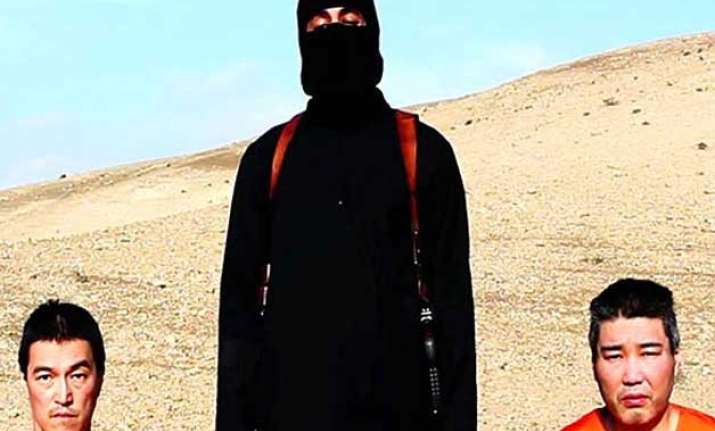 is threatens to kill 2 japanese hostages demands 200