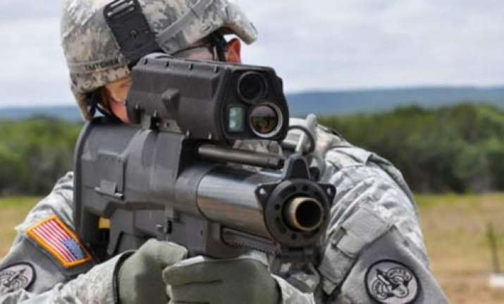 futuristic us army rifle uses radio controlled bullets that