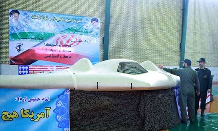 iran claims it hacked into drone software gps and forced it