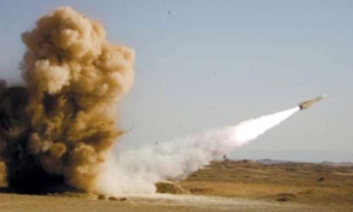 iran test fires 14 missiles