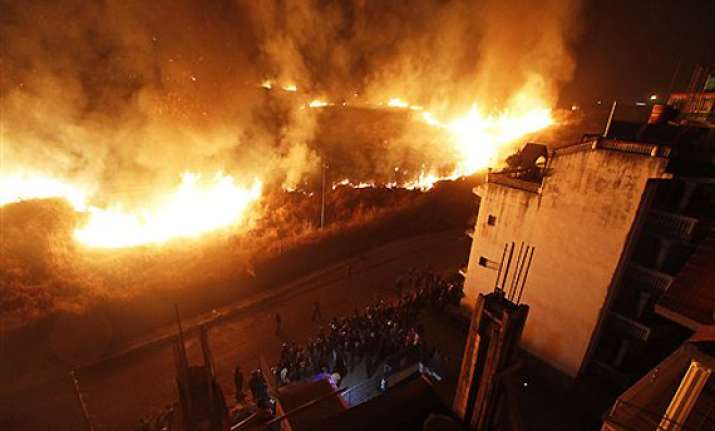 kathmandu airport closed due to grass fire