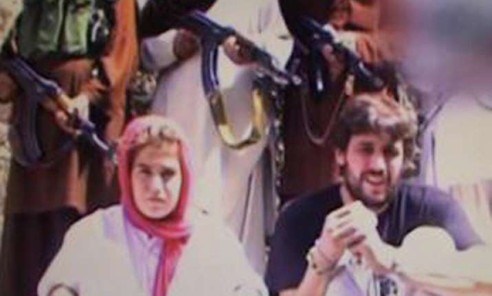 kidnapped swiss couple appear in two new videos