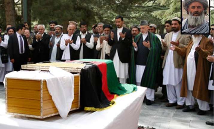killer of karzai s aide received calls from pakistan