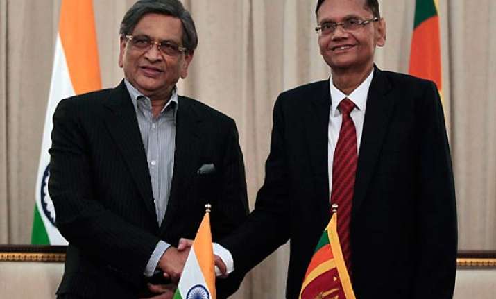 lanka fm requests krishna to re consider vote on un