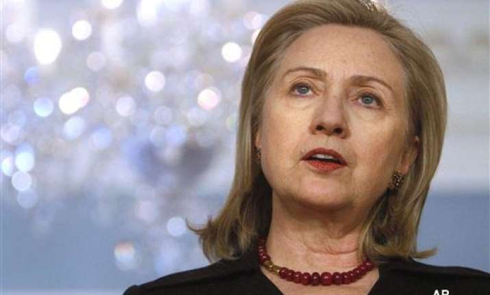 leave libya as soon as possible clinton tells gaddafi