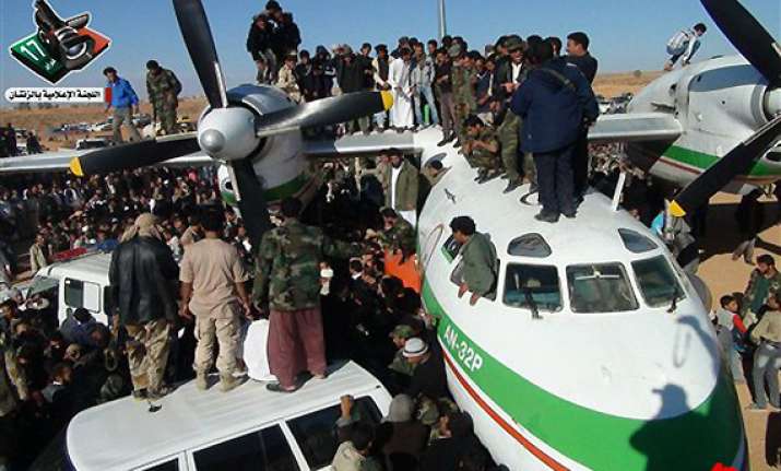 libya says gaddafi s son to be tried at home