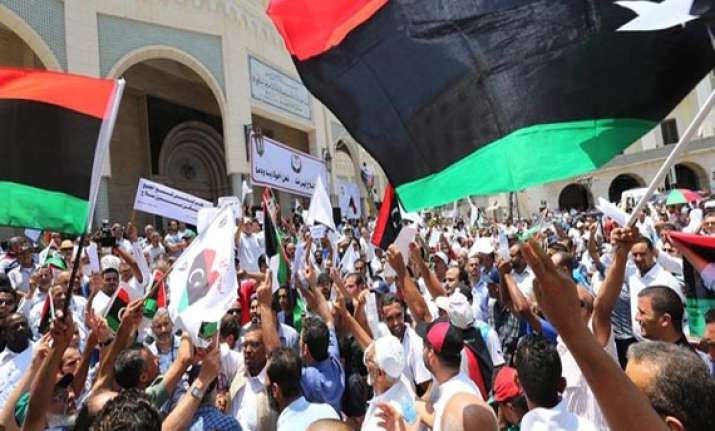 libyan protesters storm islamist offices