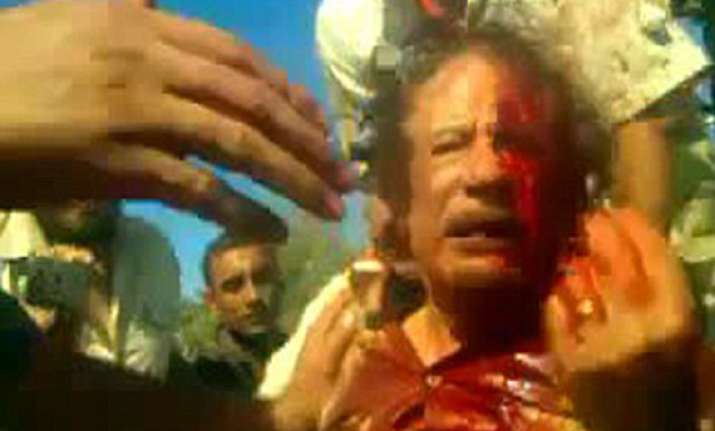 libyan puts up gaddafi s bloodied shirt ring for 2 million