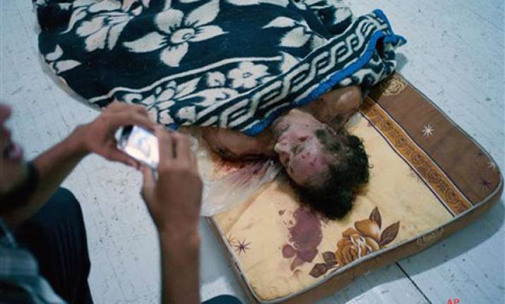 libyans rule out gaddafi post mortem but promise probe