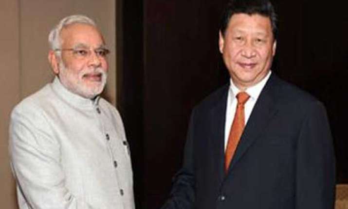 narendra modi meets xi jinping wants to solve border row