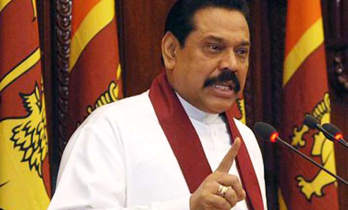 no one has to tell us what to do says rajapaksa