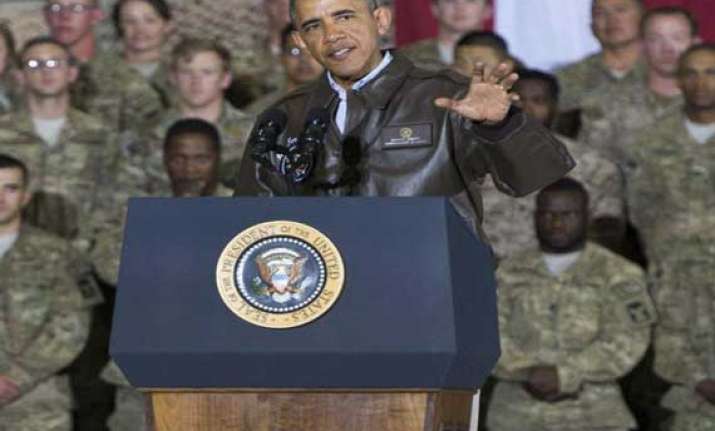 obama announces plan to leave only 9 800 troops in