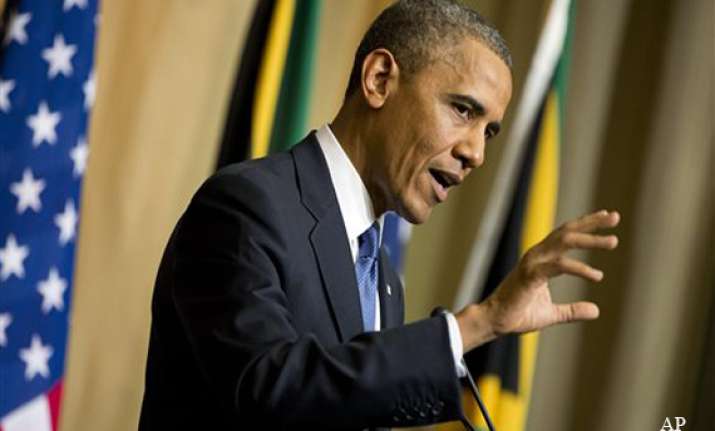 obama meets privately with mandela family