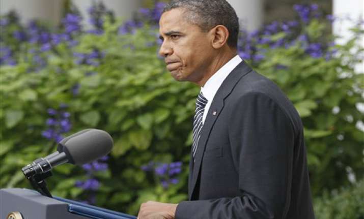obama hails gaddafi demise warns arab regimes