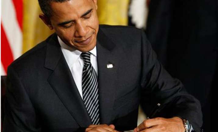 obama signs defense bill despite reservations