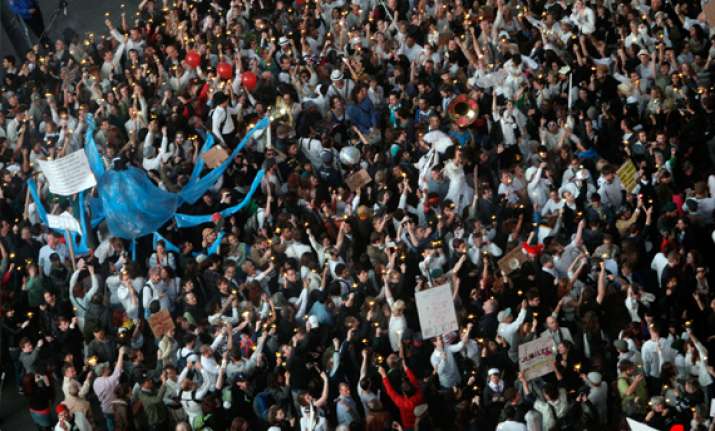 occupy wall street shows muscle raises 300k