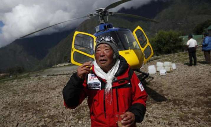 oldest climber returns safely from everest