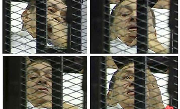 mubarak s trial begins pleads not guilty