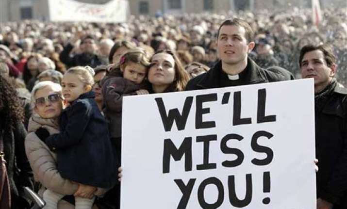 outgoing pope blesses huge crowd in st. peter s square