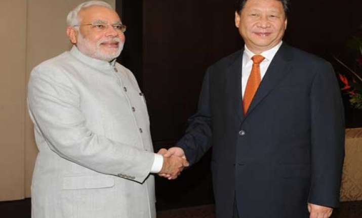 pm modi meets chinese president presses for solution to
