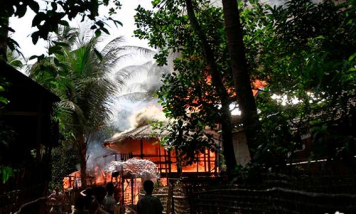 police collect bodies in strife torn myanmar town