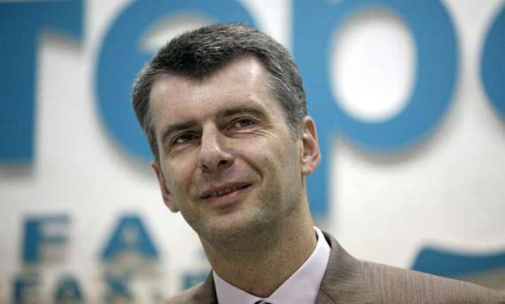 prokhorov russian tycoon to run against vladimir putin