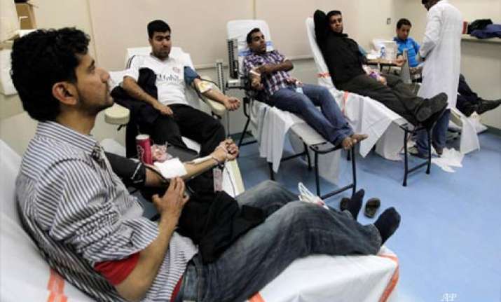 protesters help the wounded in bahrain hospital
