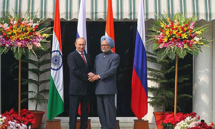 putin presents antique painting map mughal coin to pm