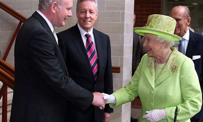 queen in historic handshake with her cousin s killer
