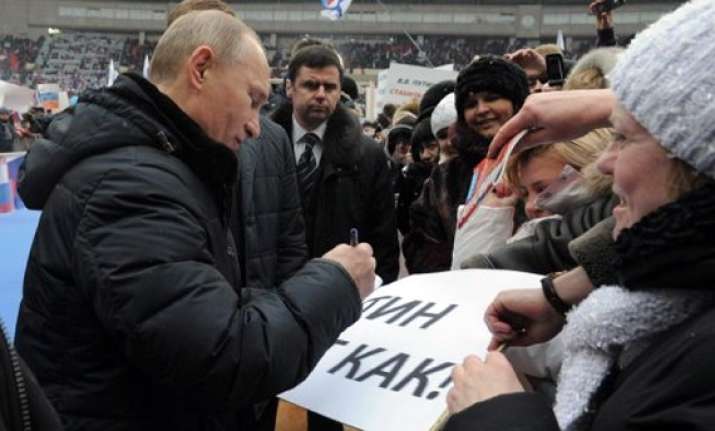 virgin voters in russia wooed by racy putin election videos